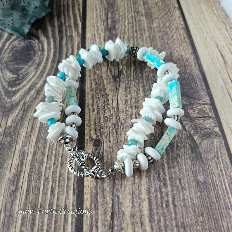 Hand Beaded Blue Opal Puka Shell Crisscross Bracelet