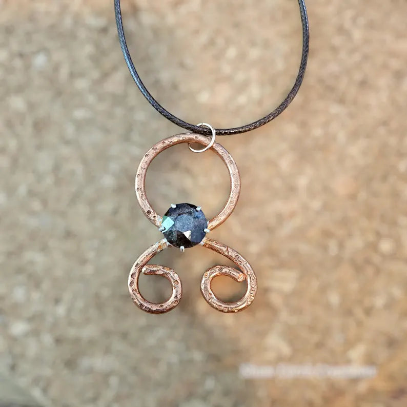 Handcut Garnet Copper Troll Cross Necklace