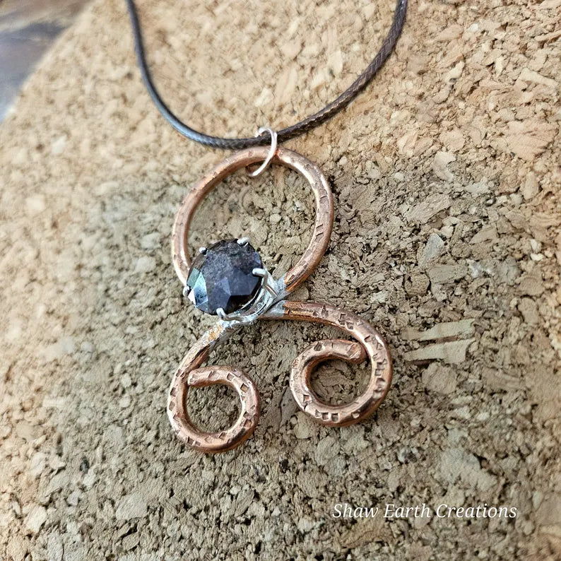 Handcut Garnet Copper Troll Cross Necklace
