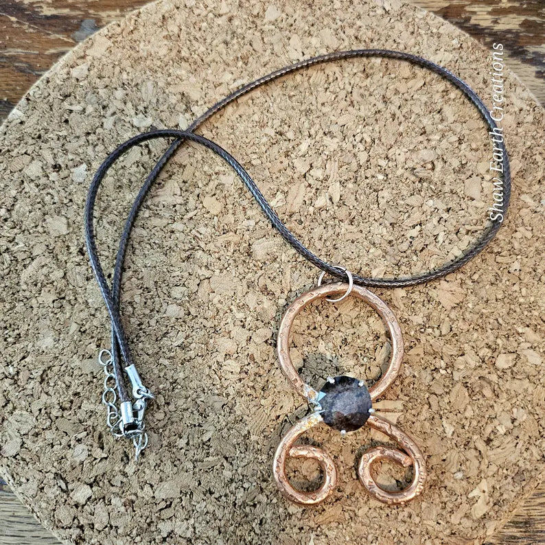 Handcut Garnet Copper Troll Cross Necklace